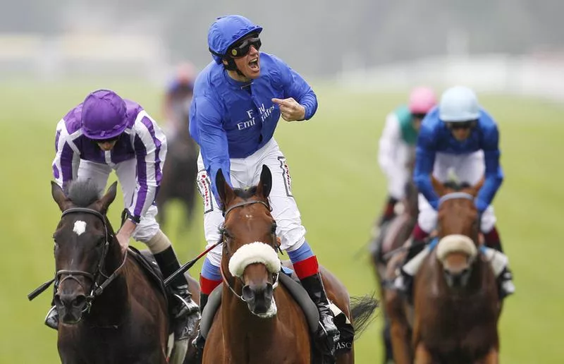 Frankie Dettori reacts as he wins the Prince of Wales's Stakes