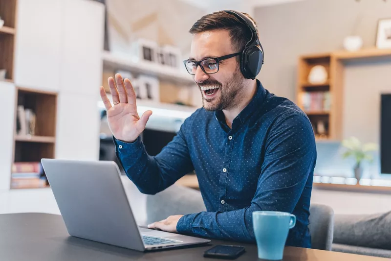 Waving at computer